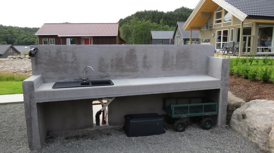 Fischreinigung fließend Wasser außen