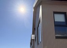 Neubau 2026 - Fewo Sunrise, im Hintergrund der Hafen 
